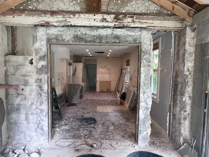 Demolition of the door opening for extended kitchen space